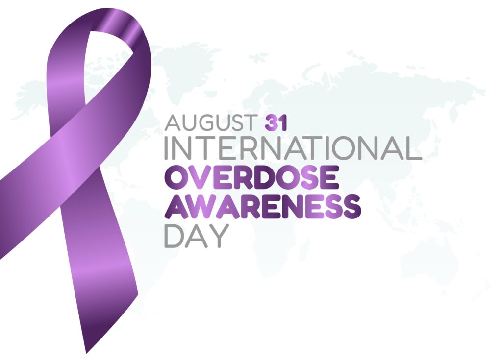 purple ribbon for August 31st international overdose awareness day